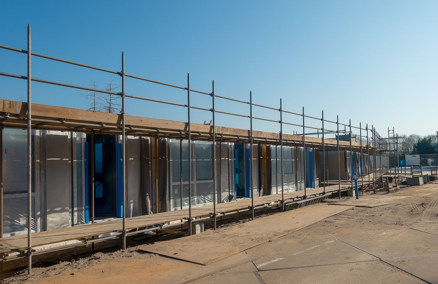 Open access lane beside a building under construction